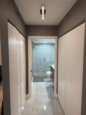 a bathroom with a toilet and a sink in it at The Yacht Club at Aventura Miami 8304 in Aventura