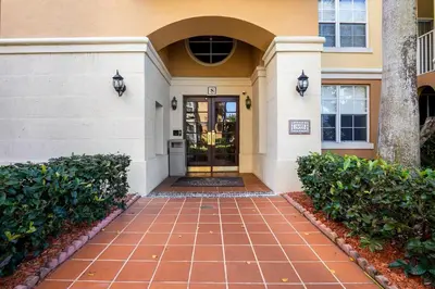 a house with a door and a brick walkway at The Yacht Club at Aventura Miami 8304 in Aventura