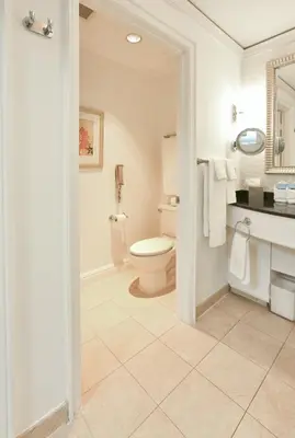 a bathroom with a toilet and a sink at Luxury Studio at The Ritz-Carlton Key Biscayne in Miami