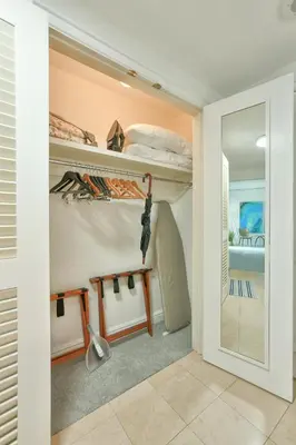 a room with two bunk beds and a mirror at Luxury Studio at The Ritz-Carlton Key Biscayne in Miami