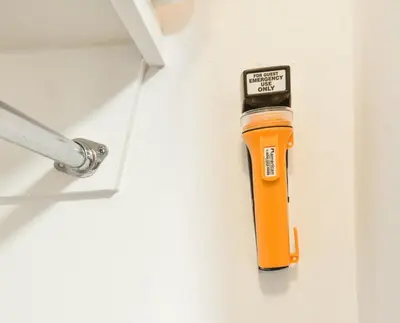 an orangeitizer in a corner of a wall at Luxury Studio at The Ritz-Carlton Key Biscayne in Miami