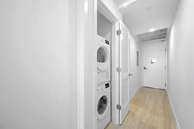 a laundry room with two washer and dryer at NOK Amazing 1 BR in Miami Beach in Miami Beach