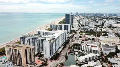 an aerial view of a city next to the ocean at South Beach Amazing Ocean View in Miami Beach