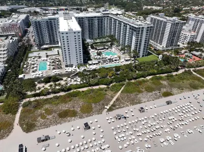 an aerial view of a large parking lot with buildings at South Beach Amazing Ocean View in Miami Beach