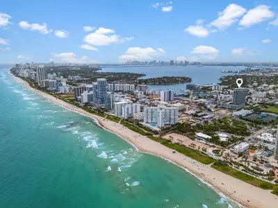 an aerial view of the beach and buildings at 72 Park- Luxury Condo With Private Beach Access in Miami Beach