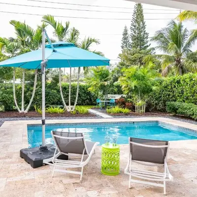 Stylish 2BR Oasis with Pool Mini Golf & BBQ