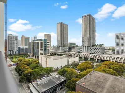 an overhead view of a city with tall buildings at Central Downtown Condo - Rooftop Pool Access in Miami