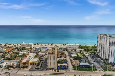 an aerial view of a city and the ocean at Santorini Blu Elegant 1BR Beach Retreat On the Beach in Hollywood