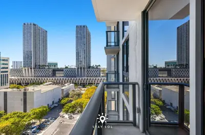 a balcony with a view of a city at 1BR Apartment New Luxury in Miami
