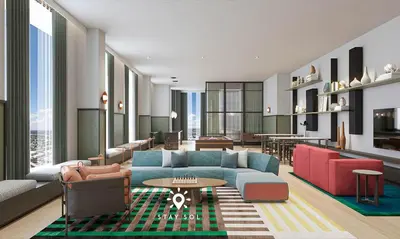 a living room with a couch and chairs and a table at Downtown Retreat Pools Spa & Lounges Miami in Miami