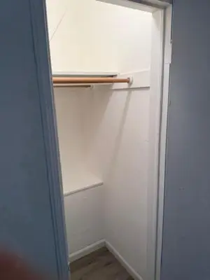 an empty refrigerator with a window in a room at 9064 Collins Ave 2 in Miami Beach