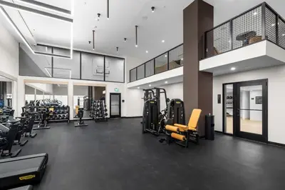 a gym with treadmills and cardio equipment in a building at Upscale Residence at District 225 - Downtown Miami in Miami