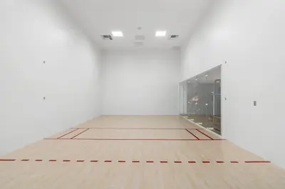 an empty room with a glass door and a wooden floor at Upscale Residence at District 225 - Downtown Miami in Miami