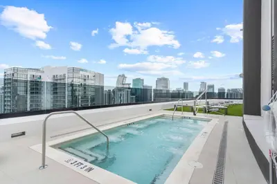 a hot tub on the roof of a building at Upscale Residence at District 225 - Downtown Miami in Miami