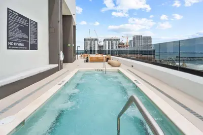 a hot tub on the roof of a building at Upscale Residence at District 225 - Downtown Miami in Miami