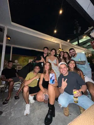 a group of people are posing for a picture at Kayoma Hostel in Miami