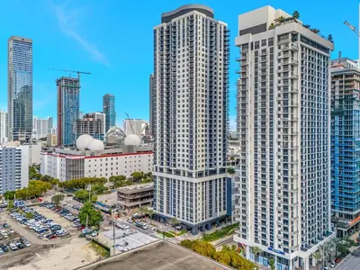 an aerial view of tall buildings in a city at Chic Downtown Miami 2BR City Views Rooftop Pool in Miami