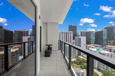 a balcony with a view of the city at Brickell Condos by Vibras Concierge in Miami