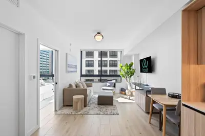 a living room with a couch and a table at Prime Location Condo at District 225 Downtown in Miami