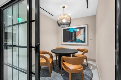 a room with a table and chairs and a window at Prime Location Condo at District 225 Downtown in Miami