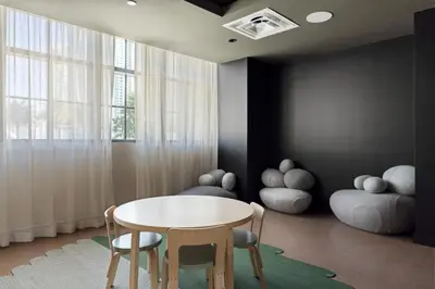 a dining room with a table and chairs and a window at 2909 Elegant 1BR in Miami Downtown with Pool and Gym in Miami