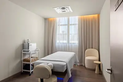 a hospital room with a bed and a window at 2105 Modern studio with Balcony a Pool and a 24 hour Gym in Downtown Miami in Miami