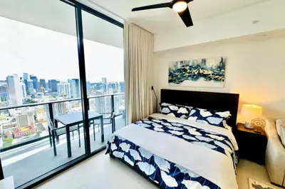 a bedroom with a bed and a large window at 4906 Cityline Penthouse Studio with Balcony a Pool and Gym in Miami Downtown in Miami