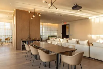 a dining room with a couch and a table and chairs at 4906 Cityline Penthouse Studio with Balcony a Pool and Gym in Miami Downtown in Miami
