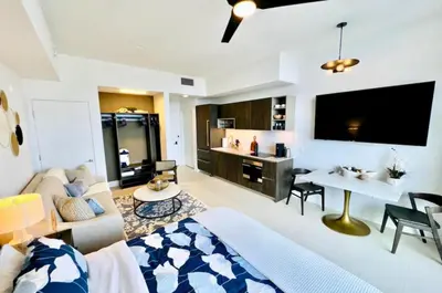 a living room with a bed and a couch and a table at 4906 Cityline Penthouse Studio with Balcony a Pool and Gym in Miami Downtown in Miami