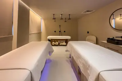 a room with two beds and a sink in it at 4905 Corner Penthouse with Sunset Views a Pool and Gym in Downtown Miami in Miami