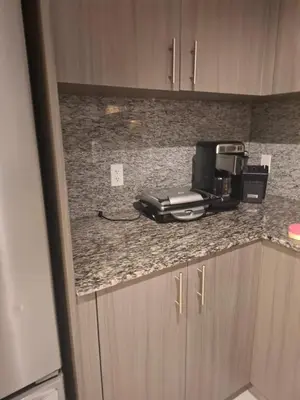 a coffeemaker sitting on a counter in a kitchen at Amazing view day & night doral in Miami