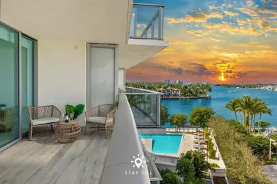 a view of the ocean from the balcony of a house at Luxury Coastal Escape Balcony views - Free Parking in Miami Beach