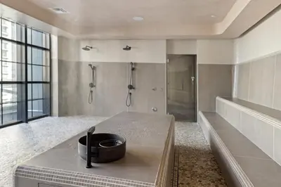 a bathroom with a sink and a bath tub at 4612 High-Floor Studio w Skyline View and a 24-hour Gym in Downtown Miami in Miami