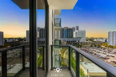 a balcony with a view of a parking lot at High Rise Haven with Pool Cowork & Spa in Miami in Miami