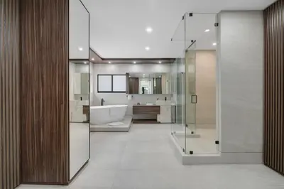 a bathroom with a bath tub and a sink at WATERFRONT MANSION Las Olas in Fort Lauderdale