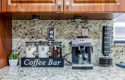 a coffee shop with a coffee bar on a counter at West Kendall Retreat Everglades Miccosukee in Hammocks