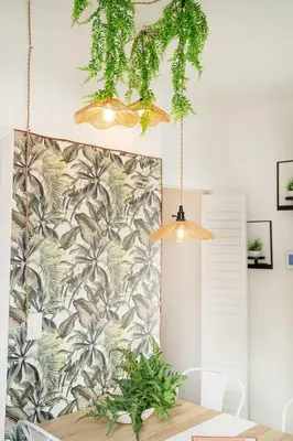 a dining room with a table and a wall at Mar & Luna Family retreat in Miami