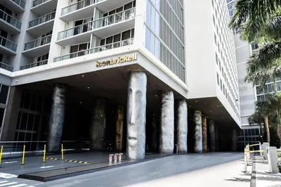 a building with columns in front of a building at MVR - Luxury Stay by Brickell Center in Miami