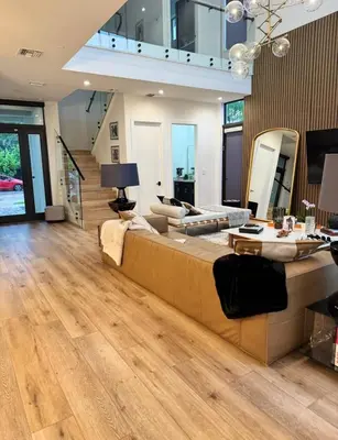 a large living room with a couch and a table at Luxury Gem in Fort Lauderdale