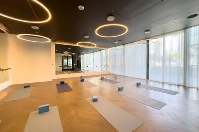 a large room with yoga mats on the floor at 2907 Modern Apartment in Downtown Miami with Pool and Gym in Miami