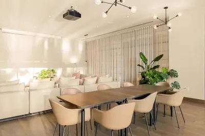 a dining room with a table and chairs at 2907 Modern Apartment in Downtown Miami with Pool and Gym in Miami