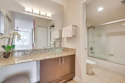 a bathroom with a sink and a toilet at Resort Condo By Aventura Mall! Gated Community in Aventura
