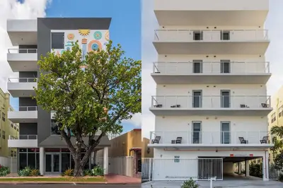 a building with a tree in front of it at Miami Beach 2Q Localização Incrível a Pé da Praia in Miami Beach