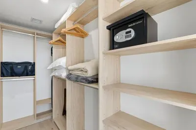 a tiny house with a tv in a room at Well-Located Condo with Free Parking and Amenities in Miami