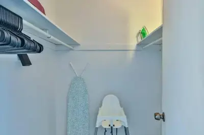 a room with a bathroom with a toilet and a shelf at Dream Beach Room Free Parking - 02227 in Sunny Isles Beach
