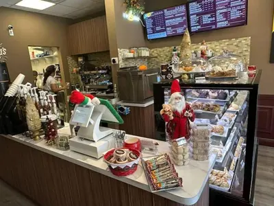 a store counter with santa claus on the counter at Dream Beach Room Free Parking - 02227 in Sunny Isles Beach