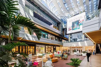 a large shopping mall with a glass ceiling at Riverside Retreat Skyline Views & Beach Nearby in Miami