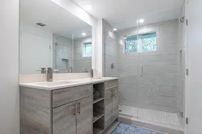 a bathroom with a sink and a shower at Comfortable 3BR Apartment, 4 Beds, Free Parking Included in Hallandale Beach
