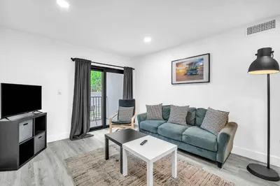 a living room with a couch and a tv at West Brickell #2 Renovated 2 2 Apt + Parking in Miami