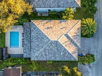 an overhead view of a roof with a clock on it at Casa Monstera Heated Saltwater Pool Game Room Golf in Fort Lauderdale
